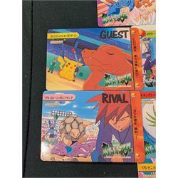 Collection of Pokemon TGC trading cards, including two WB First Movie Black Star promo cards Pikachu no. 4 and Dragonite no. 5, two Ancient Mew Black Star holo promo cards, Gym Challenge Giovanni's Persian 8/132 holo and a small collection WOTC, Neo Discovery and Neo Genesis cards, together with thirty four Bandai Carddass Pokemon cards, including prism Charizard no. 186 and Pokemon Topps cards including holo examples 