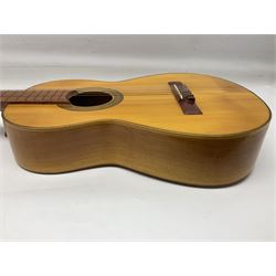 Encore black electric cut-away guitar L96cm; and Spanish Victor Garcia model 187 acoustic guitar, bears label dated 1972 L99cm; each in soft carrying case (2)