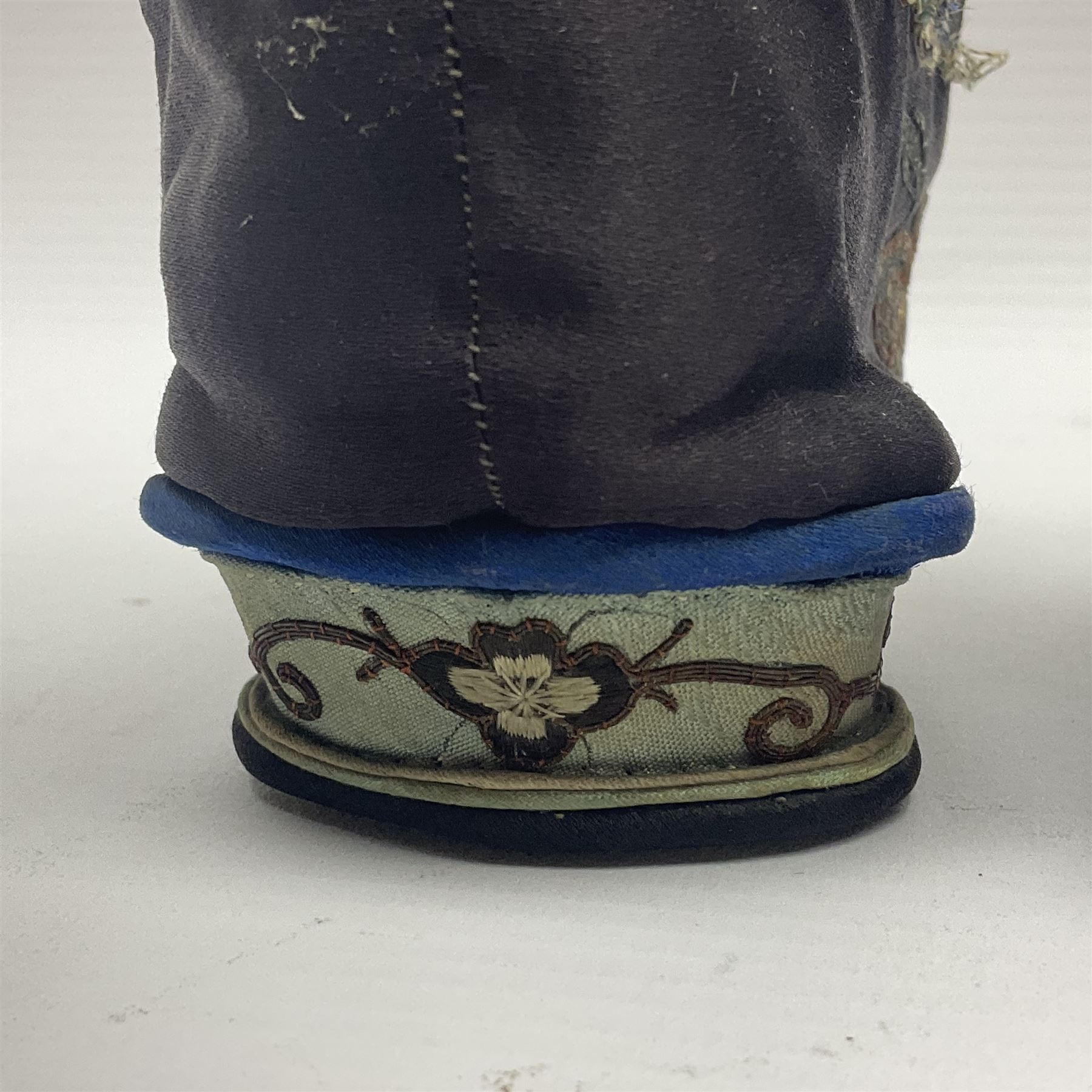 Pair of Chinese silk embroidered lotus shoes, for bound feet, a blue ground with floral detailing L15cm