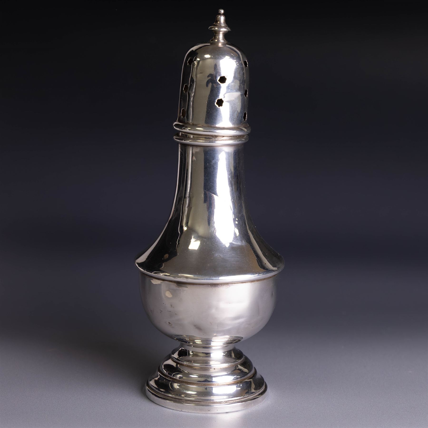 1920s silver sugar caster, of typical form with removable pierced cover and weighted base, hallmarked Marson & Jones, Birmingham 1923, H16cm