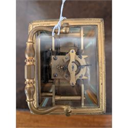 Late 19th century French 8-day brass cased carriage clock, Henry Marc of Paris, the gorge case with swing handle and four bevelled glass panels, white enamelled dial with Roman numerals and minute markers and steel hands, the two train movement with platform lever escapement, hour striking on a bell, with key
