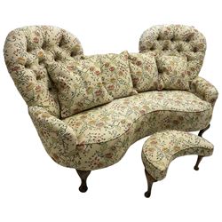 Victorian design hardwood-framed double back settee, upholstered in buttoned floral pattern fabric, curved back over serpentine seat, on cabriole feet, with matching scatter cushions (W182cm, H94cm, D86cm); together with crescent-shaped footstool with cabriole feet (W55cm)