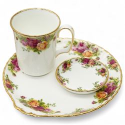 Royal Albert Old Country Roses tea and dinner service comprising four dinner plates, four dessert plates, four soup bowls, six cups, seven saucers, twelve side plates, tea pot, supper plate with mug and saucer dish