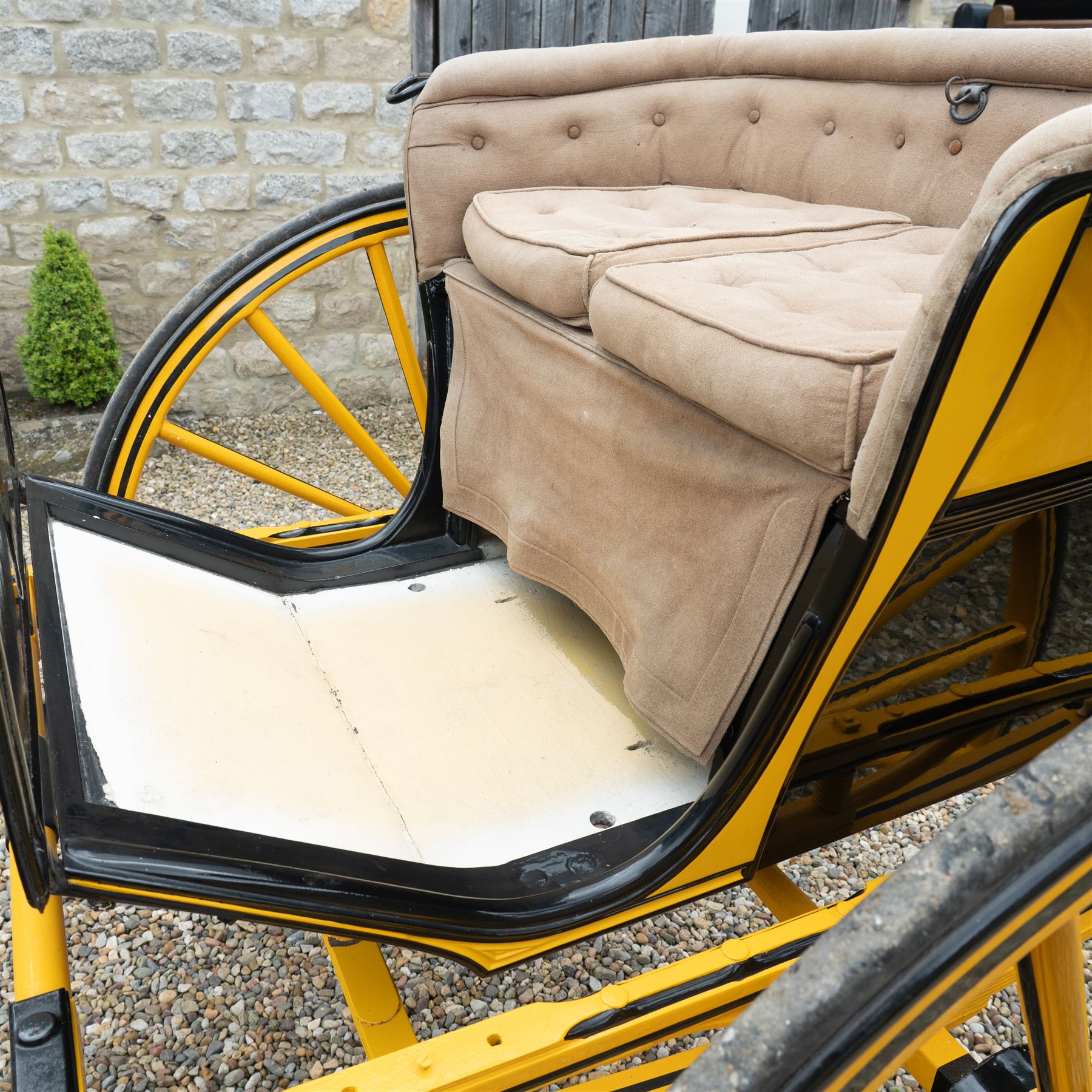 Victorian Two Wheeled Pleasure Driving Round Back Gig by Shanks of London

A Victorian two wheeled pleasure driving round back gig, painted in black and yellow, with upholstered forward facing seat for two, panelled dashboard, wooden spoked wheels, iron step and shafts for a single horse. The vehicle is fitted with a rear luggage compartment and mounted on elliptic springs.

Features
• Black and yellow painted body
• Upholstered forward facing seat
• Panelled dashboard
• Rear luggage compartment
• Wooden spoked wheels
• Iron step
• Elliptic spring suspension
• Shafts for a single horse

Dimensions:
Overall length: 310 cm
Width: 160 cm
Body width: 82 cm
Height: 160 cm

Wheel Diameters:
Wheels: 138 cm

Seating:
Driver and passenger: 2