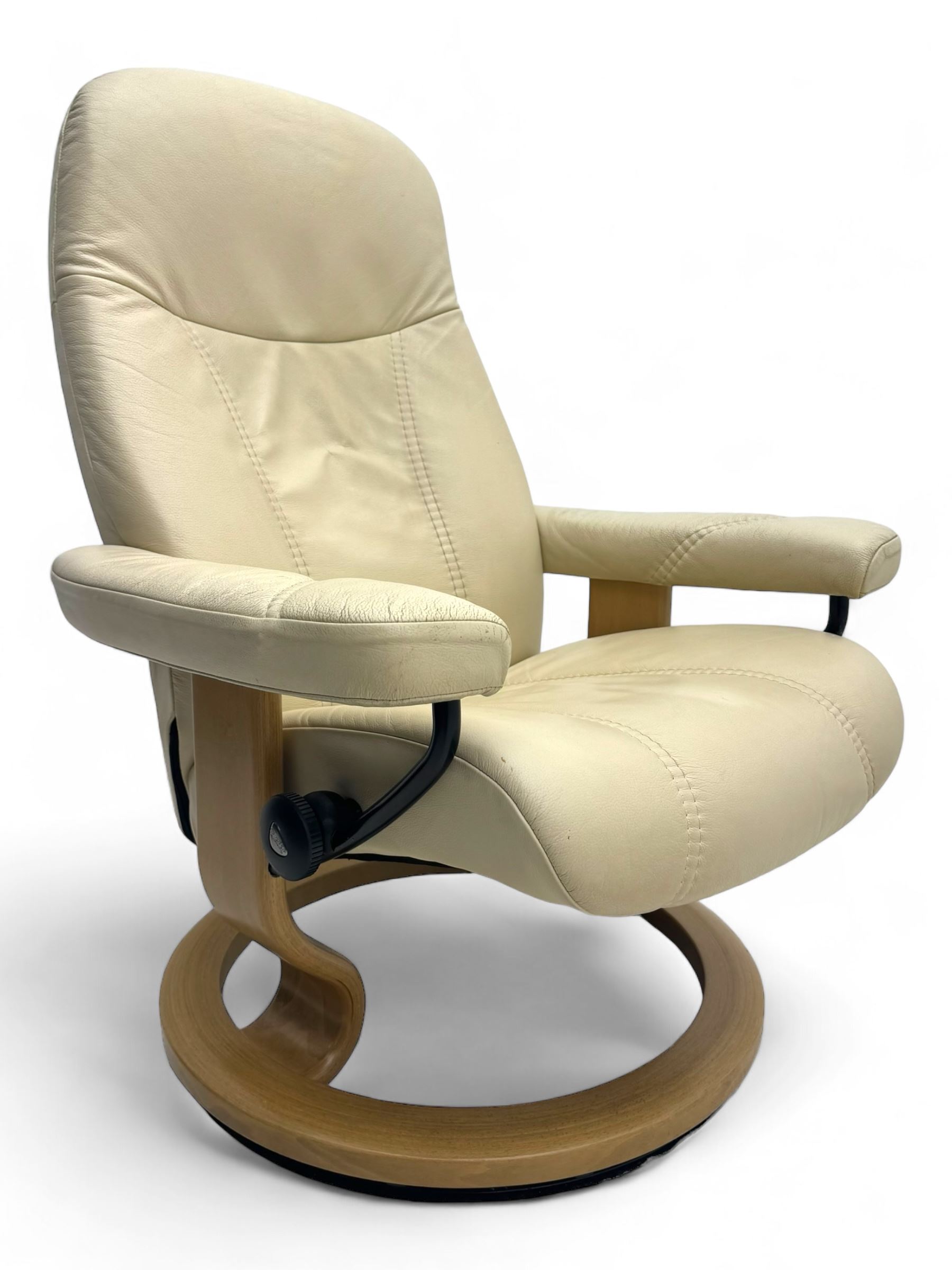 Ekornes Stressless - swivel and reclining armchair upholstered in cream leather, high back and padded armrests, raised on circular base