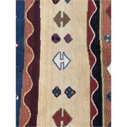 Late 20th century Louis De Poortere Belgian Shalamar wool ground rug, featuring a vibrant multi-coloured geometric design with stacked rectangular borders surrounding two central medallions, finished with fringed ends