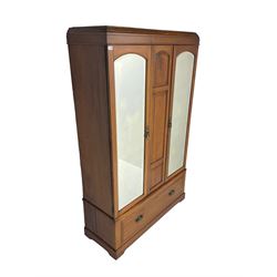 Edwardian walnut double wardrobe, fitted with two bevelled mirror panelled doors, single drawer to base
