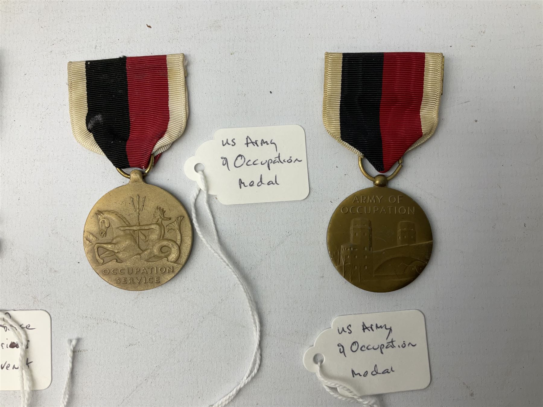 Nine American medals including WW2 Navy and Army Occupation medals, 1939-41 Defence Medal, boxed National Defence Medal and bar, South West Asia Service with bar, Air Force, National Guard and Military achievement medals etc (9)