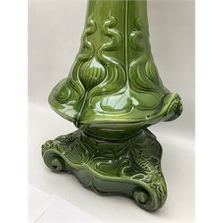 Jardiniere and stand, the jardiniere modelled as a pale, the stand with foliate and foliage decoration on a green ground, stand H73cm 