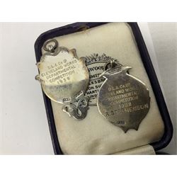 Four St John's silver fobs, together with two silver Directors Ambulance shield fobs and two other St Johns items 