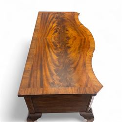 20th century figured walnut serpentine dressing table, moulded top with book-matched veneers over an arrangement of five drawers fitted with brass swan neck handles, on cabriole supports with shell carved knees