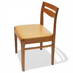 Nathan - teak oval extending dining table, together with set of eight matching low-back dining chairs with tan leather seats, extends to 203cm