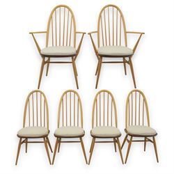 Ercol - elm dining chairs, set of six including two armchairs, arched spindle backs over s...
