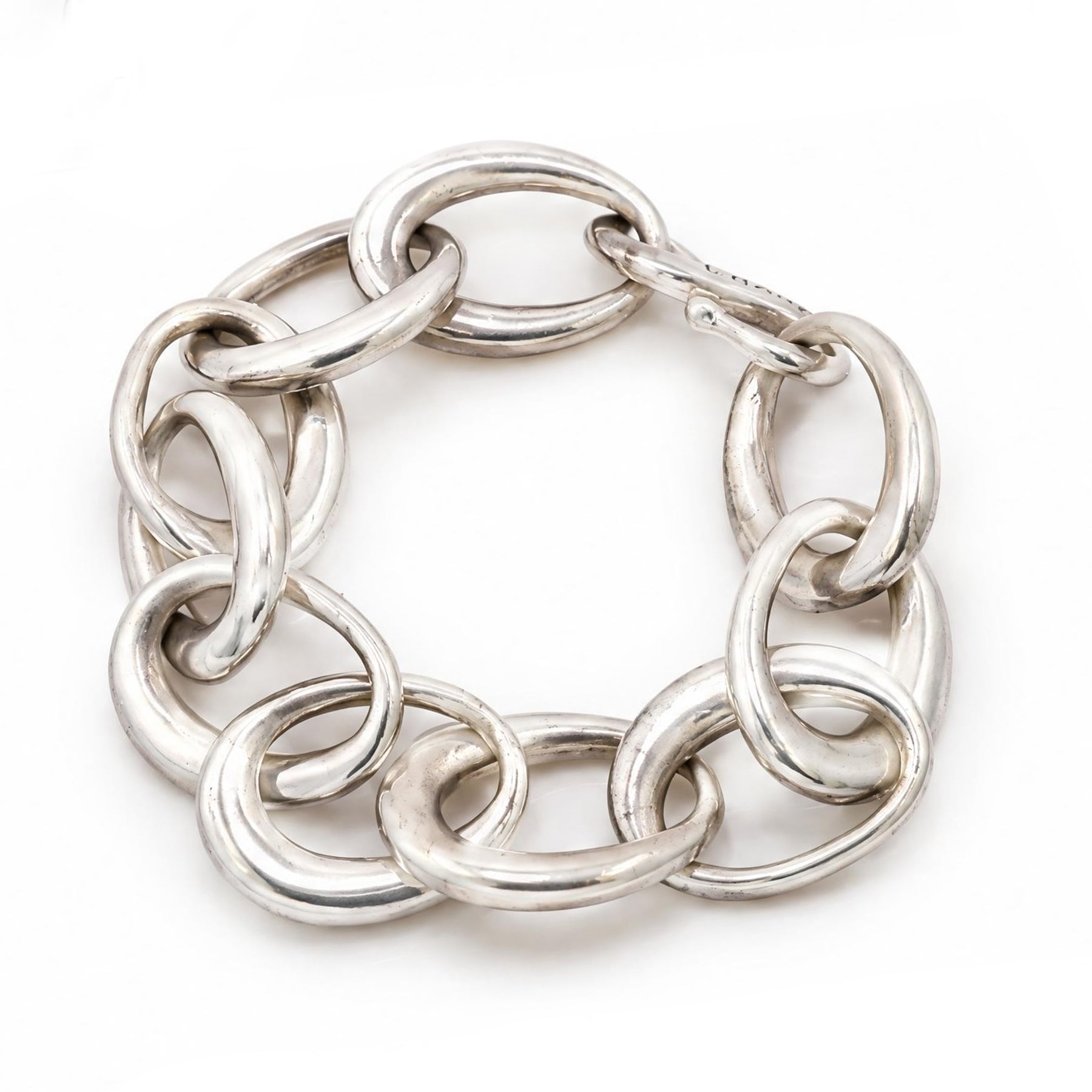 Chanel silver bracelet, with ten oval interlocking links and a hook clasp, London 2000