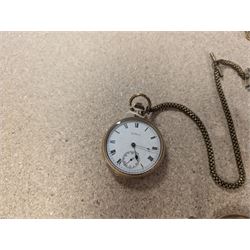 Four early 20th century gold-plated keyless pocket watches, three by Harris Stone Leeds, Waltham and Elgin and two gold-plated watch chains