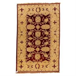 Ziegler design hand knotted wool rug, the rich red ground woven with oversized floral meda...
