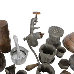 Two copper jelly moulds, collection of metal cookie cutters and moulds, LF&C nut butter grinder, fruit press and other metalware