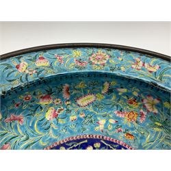 18th/19th century Chinese Canton enamel basin, the circular basin with flat everted rim, decorated with scrolling foliate and fruit decoration on a blue ground, D43cm