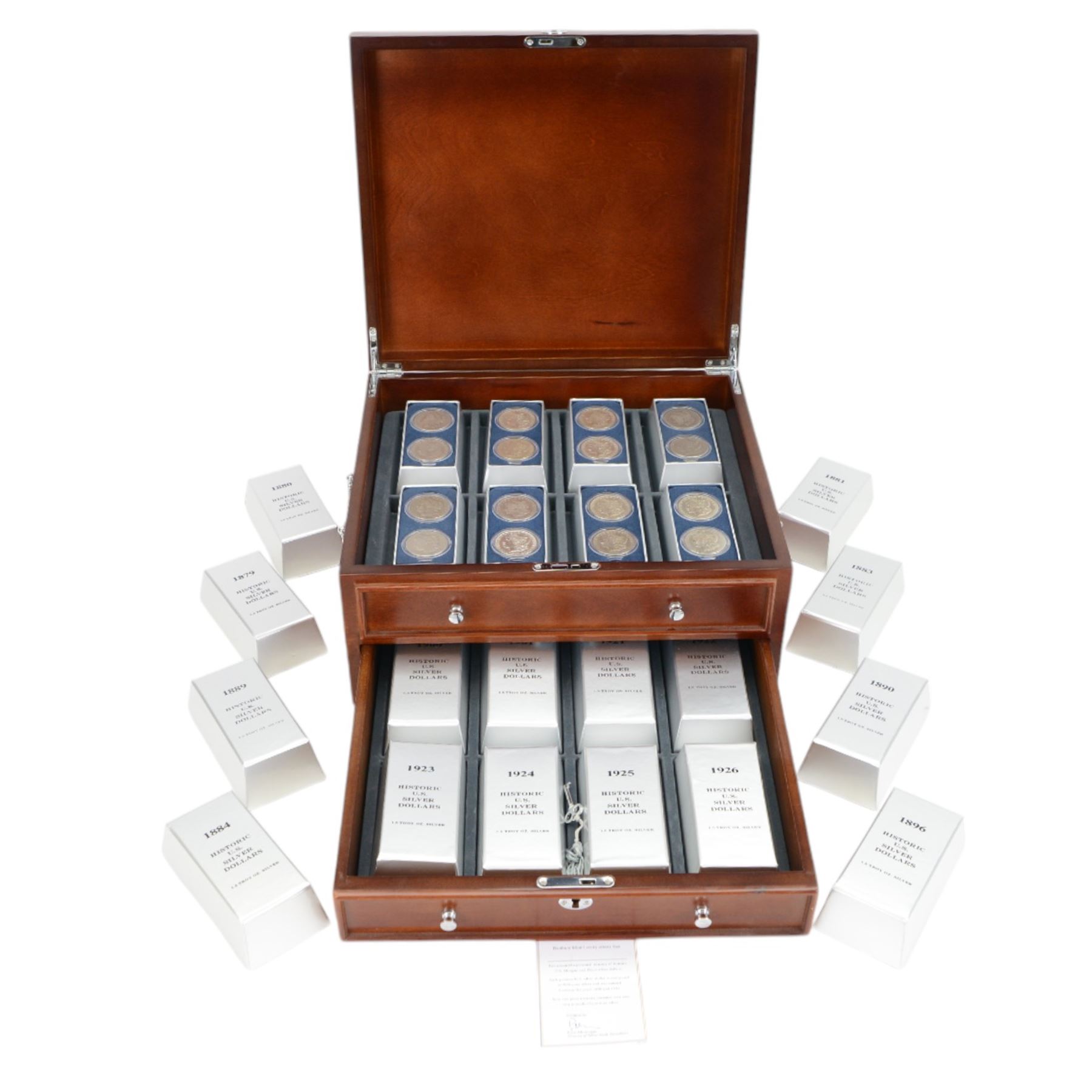 Thirty two United States of America silver dollar coins, 1879-1926, presented in Danbury Mint 'Historic US Silver Dollars' chest