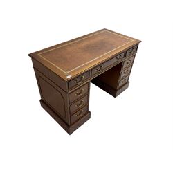 Georgian design mahogany twin pedestal desk, rectangular top with leather writing inset, fitted with nine drawers