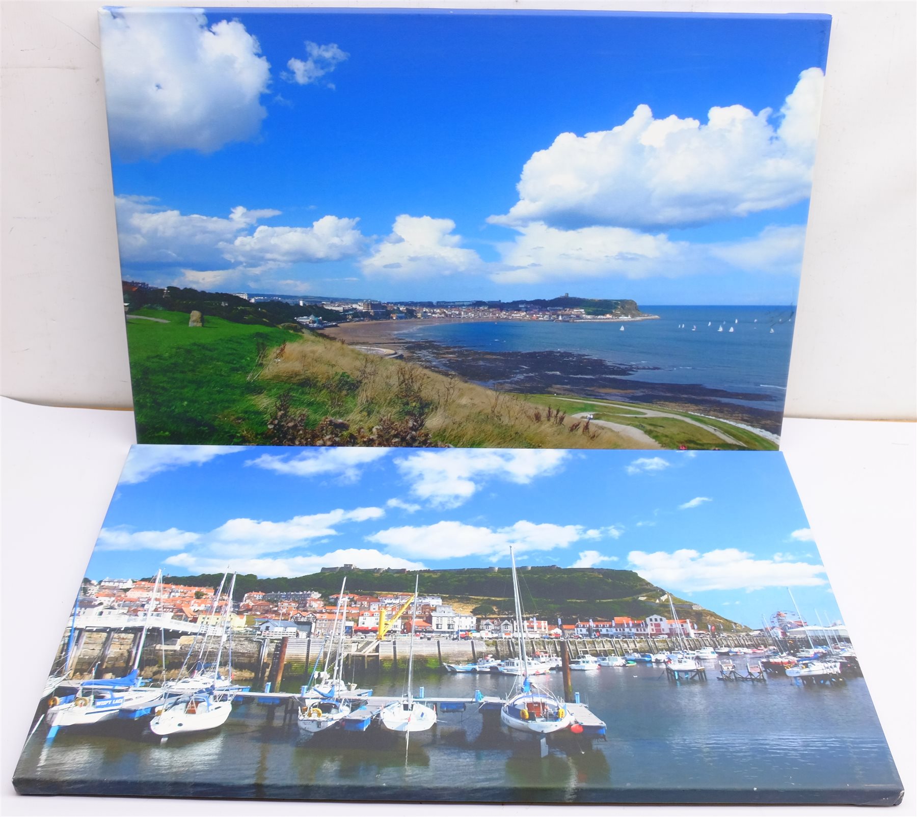 Sue McDonald 'Beside the Wave Gallery', poster print 69cm x 49cm; Scarborough Harbour & Robin Hood's Bay, pair gloss finish photographs 39cm x 29cm; Scarborough South Bay and Harbour, pair photographic prints on canvas 51cm x 76cm (5)