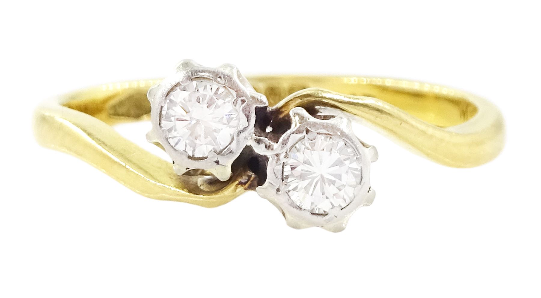 18ct gold diamond crossover ring, set with two round brilliant cut diamonds, Birmingham 1962, total diamond weight approx 0.25 carat