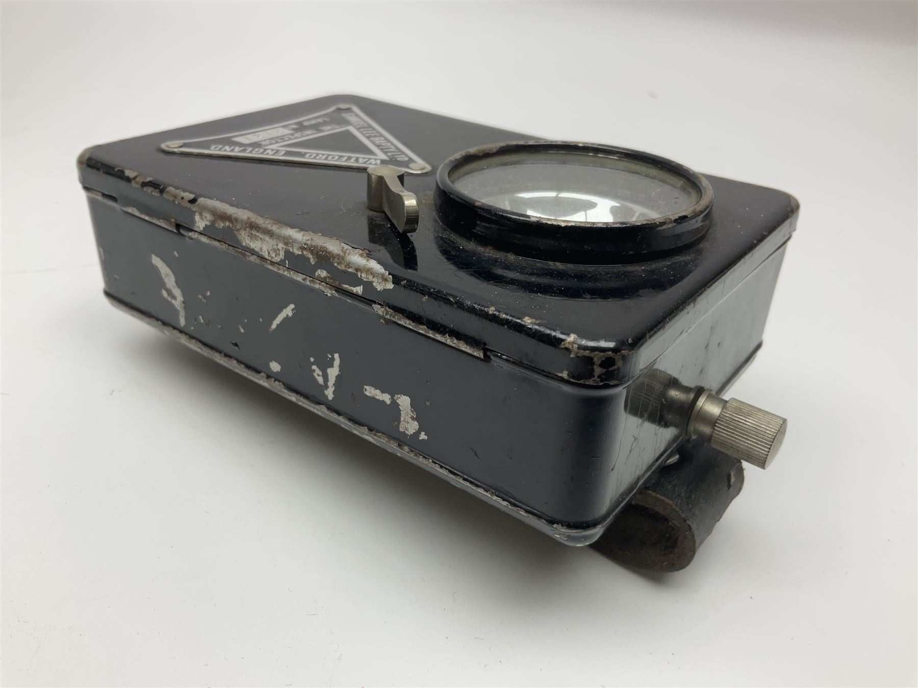 Police - Victorian turned hardwood truncheon with traces of decoration and VR cypher L42cm; Humberside Police helmet with Queens Crown helmet plate; hand lamp inscribed 'The Inspector'; and small pair of pewter figures of police officers (5)