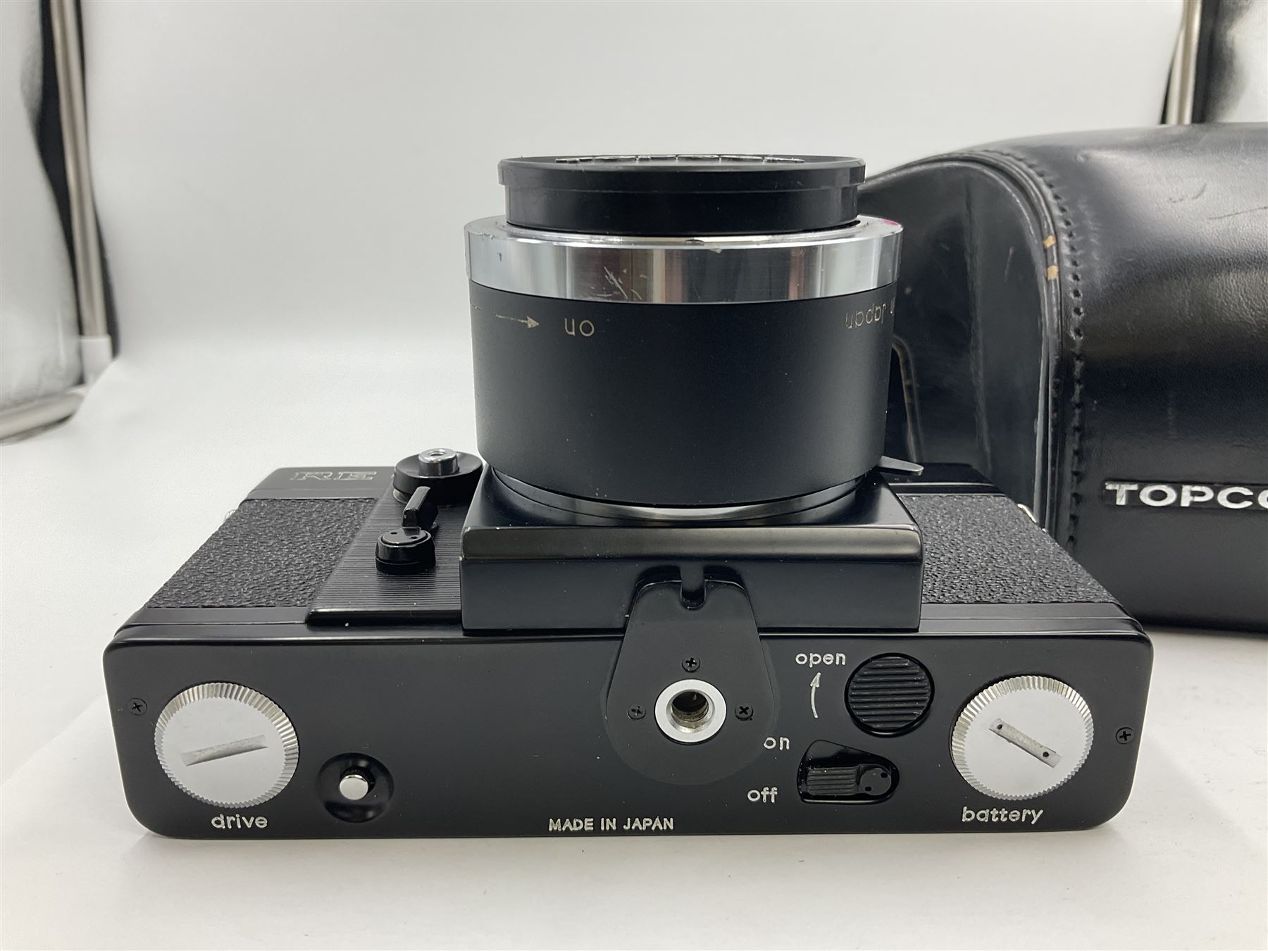 Topcon RE Super camera body, serial no.4681129, with 'RE. Auto-Topcor 1.8/5.8cm' lens, serial no. 11669018, in leather case