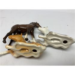 Three Beswick figures of horses, comprising Palomino foal 915, Dapple Grey foal and bay, together with Bing & Grondahl 1852 fledging sparrow modelled as a hungry baby bird and two other animal figures