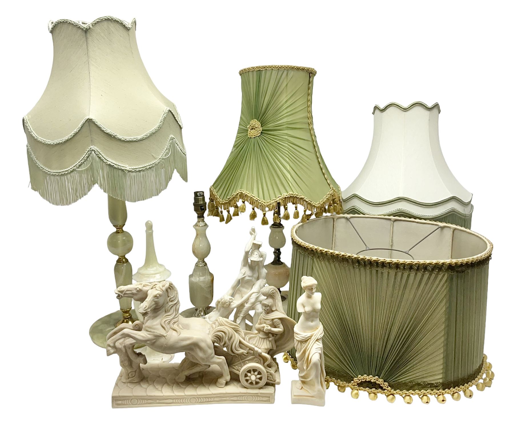 Onyx table lamp, with knopped stem and cream and green tassel shade, together with three smaller similar onyx lamps, classical style alabaster figures and a covered onyx jar