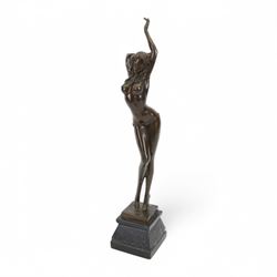 Bronze figure of a dancing nude female after Aldo Vitaleh, with signature to base, upon a black marble effect plinth, H55cm