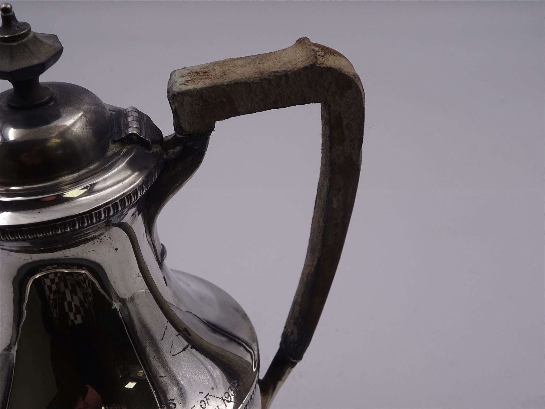 1930's silver hot water pot, of faceted baluster form with engraved dedication, and wooden handle and finial, hallmarked Harrison Brothers & Howson, Sheffield 1930, H20cm, approximate gross weight 15.66 ozt (487.2 grams)