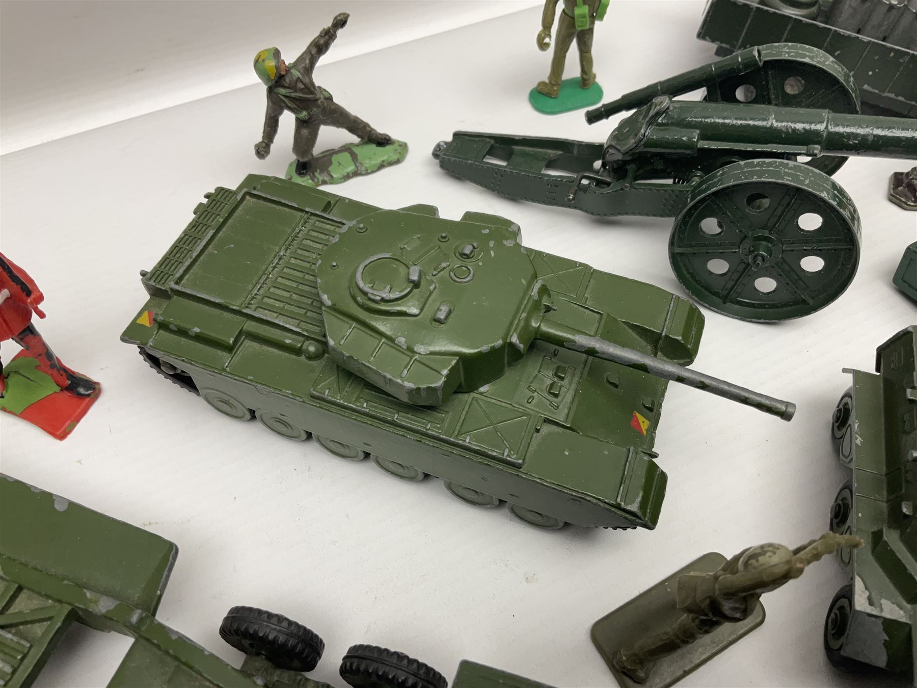 Various makers - unboxed and playworn die-cast models including Dinky Thornycroft Mighty Antar Tank Transporter No.660 and Centurion Tank No.651, other military and farm vehicles; and quantity of loose plastic soldiers and other figures by Crescent, Britains etc