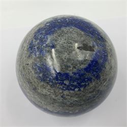 Lapis lazuli sphere, upon a carved stone stand, D10cn