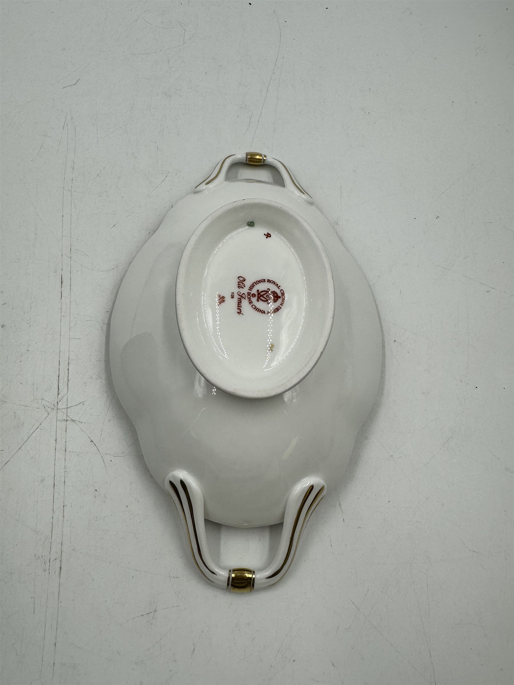 Royal Crown Derby Old Imari pattern 1128 twin handled sweetmeat dish, upon an oval pedestal, with printed mark beneath, H4.5cm, including handles W22.5cm 