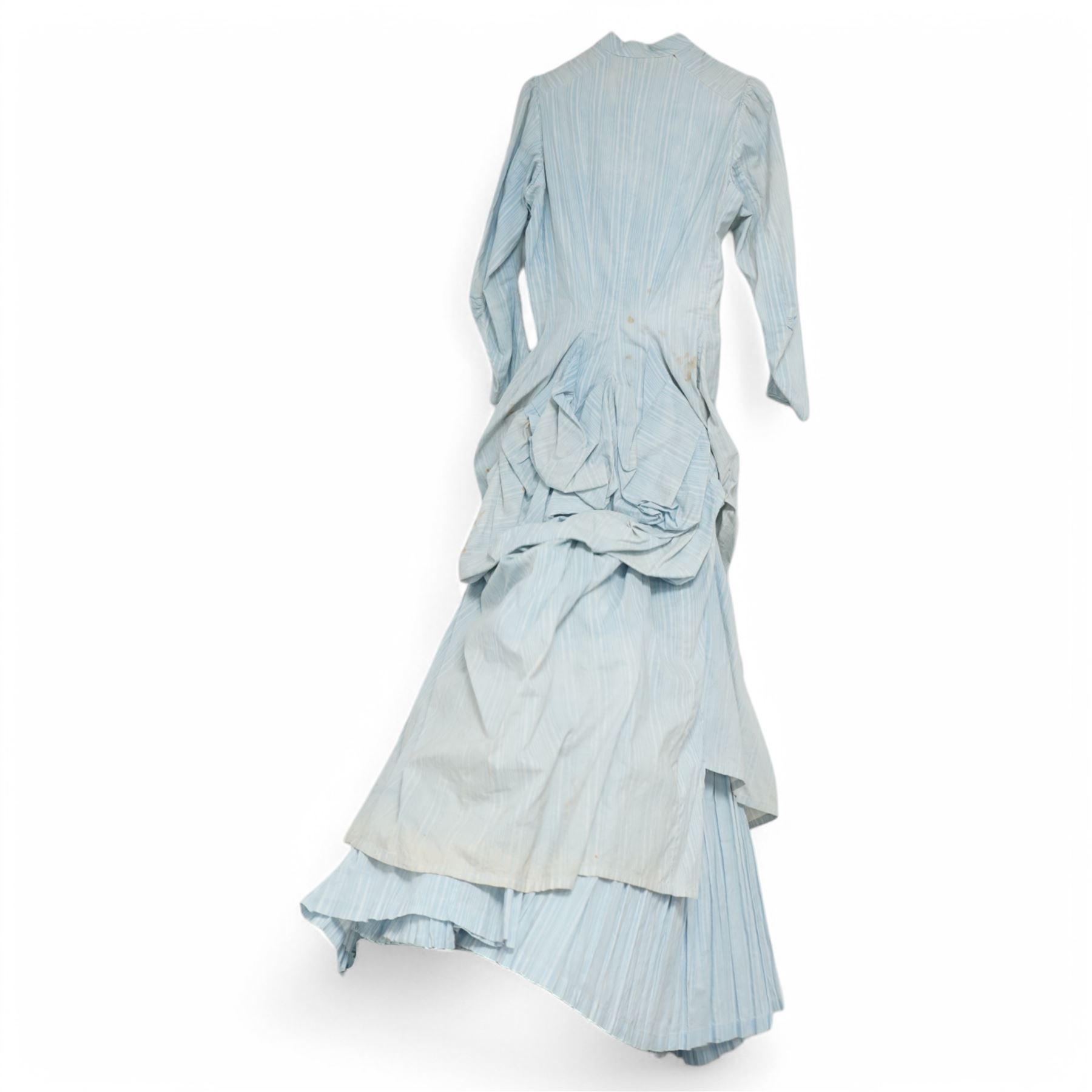 Victorian ladies button-down bodice and skirt, in blue and white striped fabric with pleated detailing, the skirt with gathered bustle back