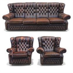Georgian design Chesterfield lounge suite, comprising highbacked four seat sofa and pair a...