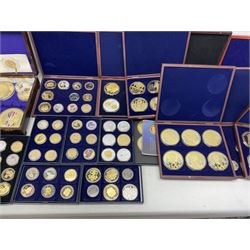 Mostly commemorative and fantasy coinage, including various Great British Queen Elizabeth II five pound coins, various coins commemorating royal events, Concorde, Churchill, past Presidents etc, housed in various display boxes