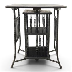Edwardian black painted side table with incorporated revolving bookcase, supported on barley twist legs