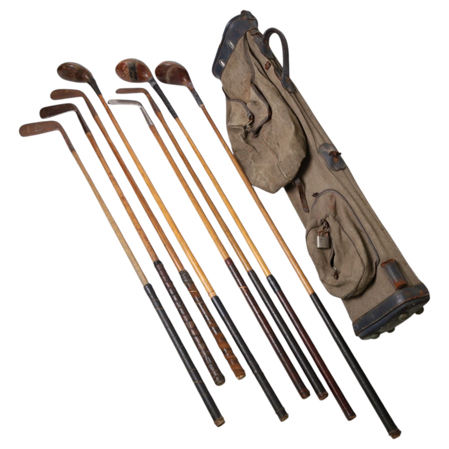 Set of eight Hickory golf clubs with a canvas golf bag