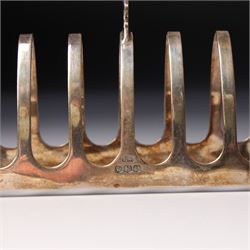 Silver six division toast rack with loop handle Sheffield 1938 Maker Viners and a silver butter knife