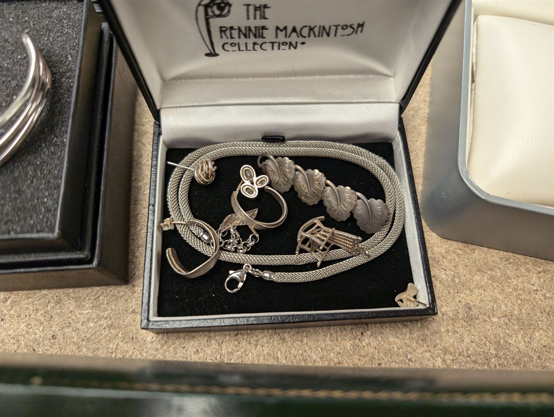 Collection of silver jewellery, including chains, brooches, bracelets and bangles, together with a collection of costume jewellery, two Skagen wristwatches and a Rotary Elite watch