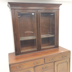  Early 20th century mahogany sideboard, two long and one short drawer, three cupboards, bracket supports (W150cm, H97vcm, D54cm) and a bookcase top, two glazed doors (W126cm, H113cm, D33cm) (2)  