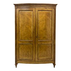 Frank Hudson - mid-20th century Mindi ash and burr walnut double wardrobe, moulded rectangular cornice over two panelled doors with chevron pattern veneers, raised on turned supports