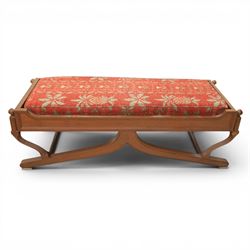 Traditional design teak long foot stool, red patterned seat cushion, on an X-frame base