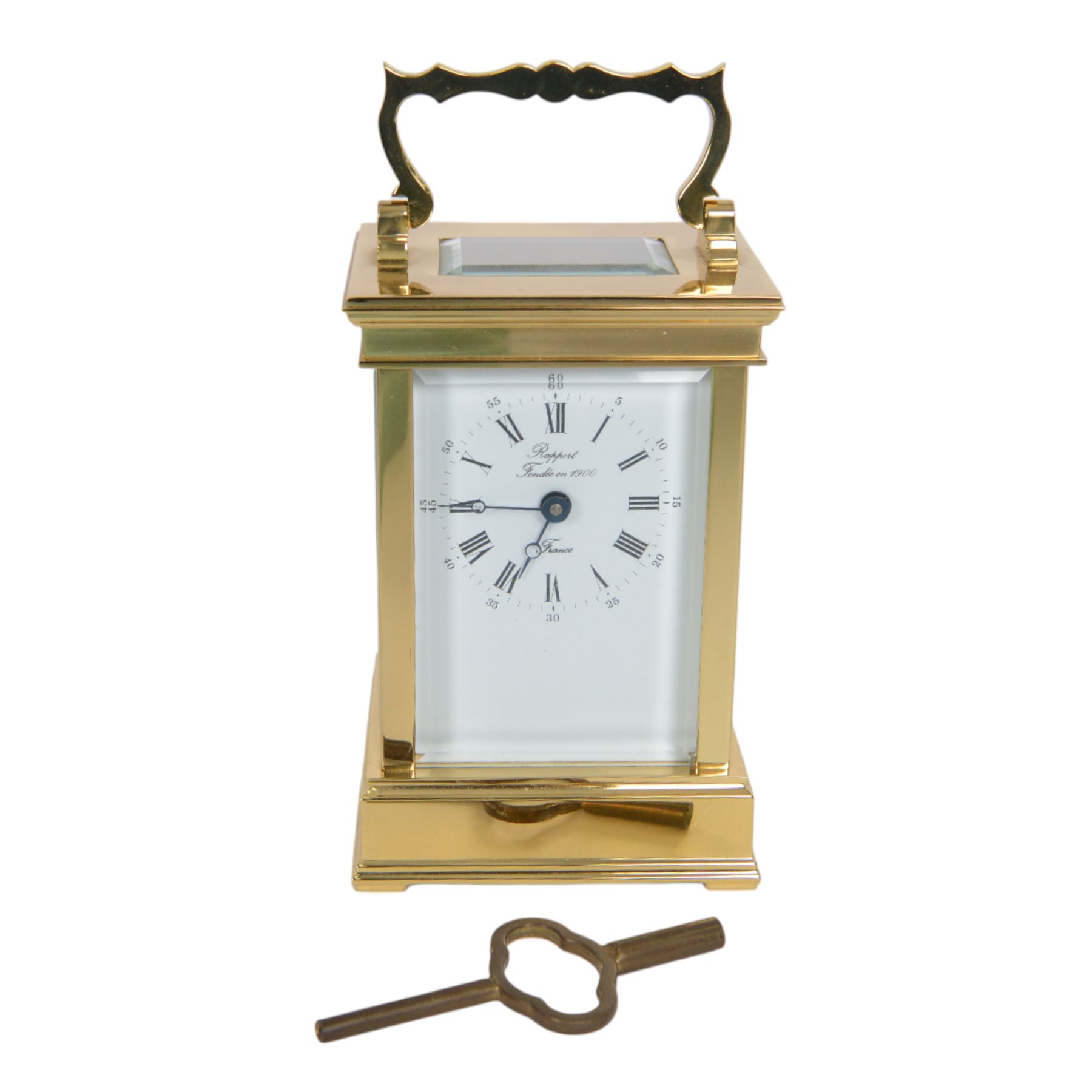 Rapport France late 20th century 8-day timepiece brass carriage clock, brass case with four bevelled glass panels, enamel dial with maker's name, Roman numerals and steel moon hands, with a jewelled lever platform escapement, movement stamped with L'Epée logo, with key.