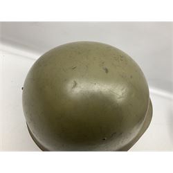 Two 1960s East Block Soviet style helmets - Czechoslovakian and Russian; both with liners (2)