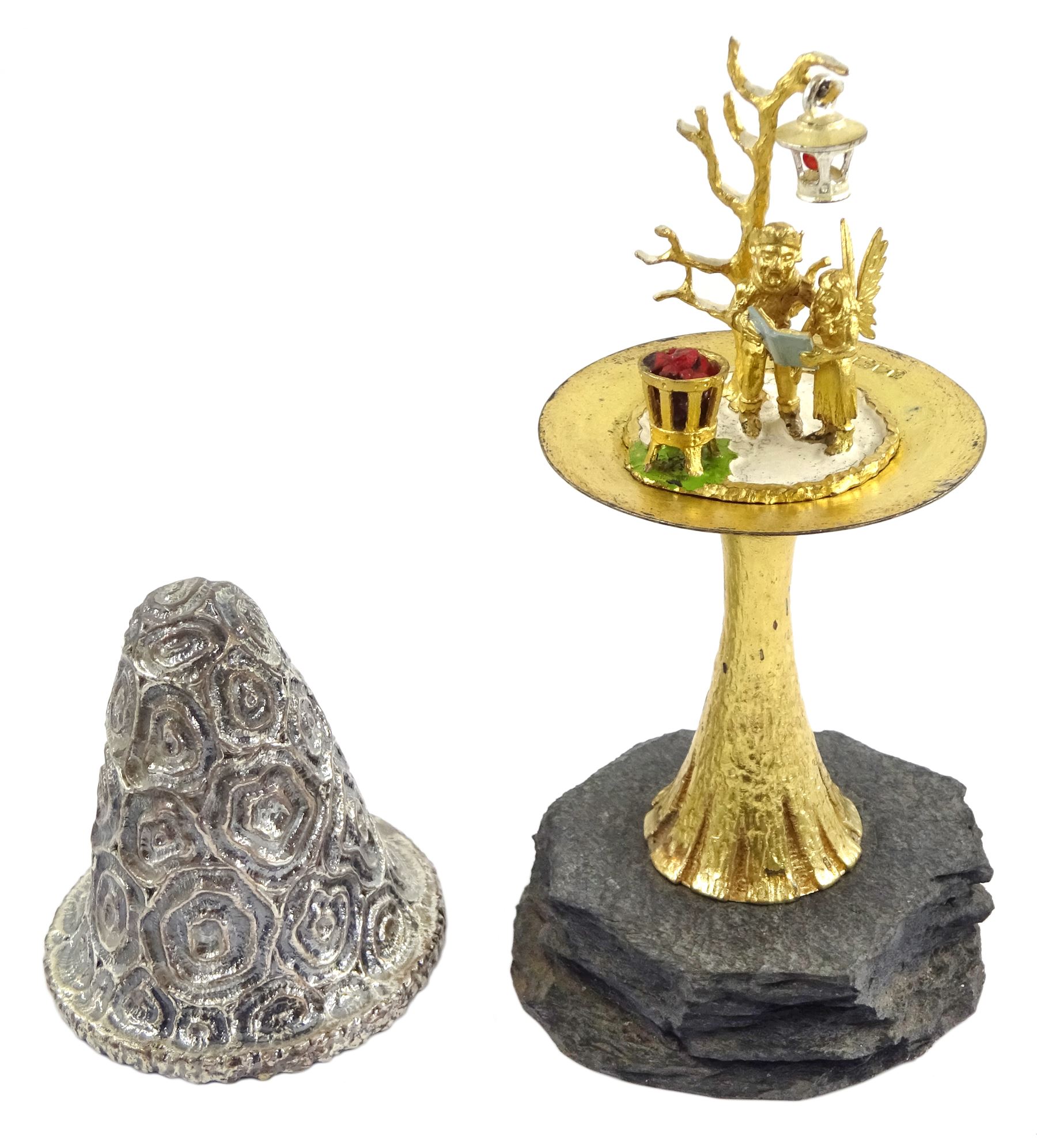 Christopher Nigel Lawrence limited edition silver and parcel gilt surprise mushroom, the textured domed cover opening to reveal two elves carolling beneath a lantern and before a fire pit set with semi-precious stones, upon a slate base, no 24/250, hallmarked Christopher Nigel Lawrence, London 1982, overall H9cm