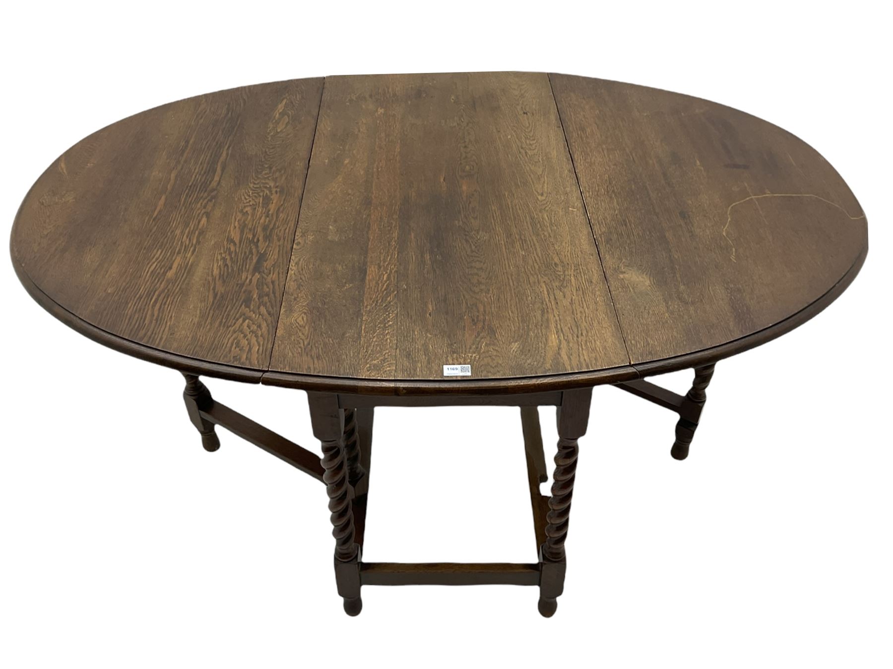 Early 20th century oak barley twist drop leaf dining table (105cm x 154cm, H74cm), and four chairs 