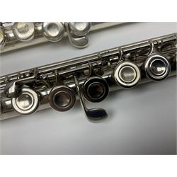 Boosey & Hawkes London Regent three-piece flute, serial no.345447; in B&H Bandhite hard carrying case; and Deg Music Company Inc. USA Claudel Model three-piece flute, serial no.491718, in hard carrying case (2)